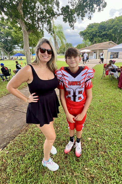 Nicole at her son's football game