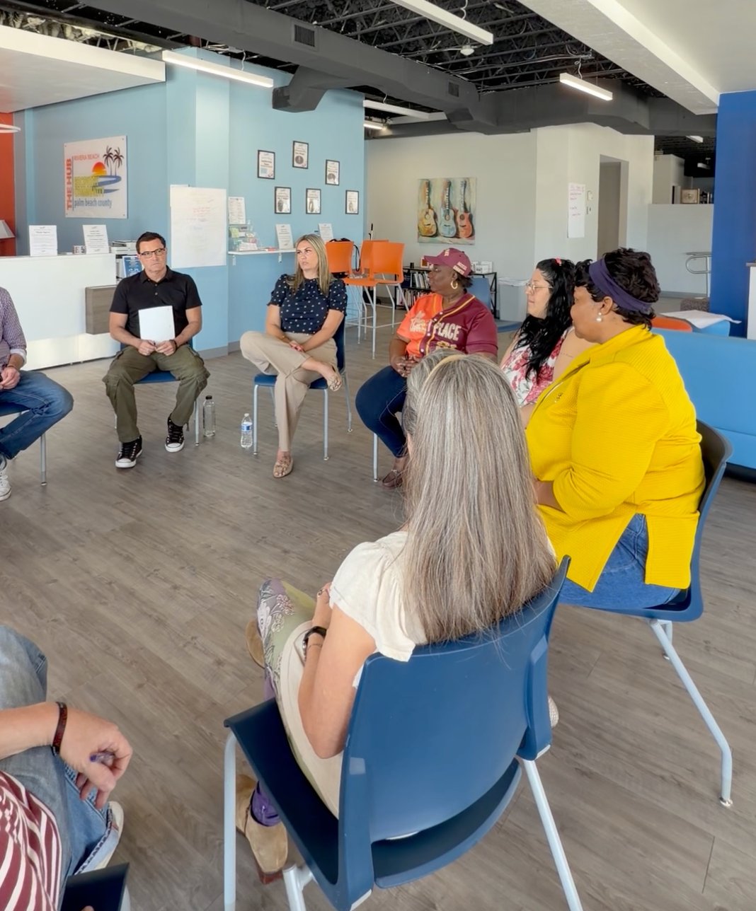 Team members seated in a circle for an honest group conversation